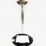 Untitled document Magnetic Pen Holder P2721* time and temperature display* a swinging pen with the effect of the magnet* scratchpad available